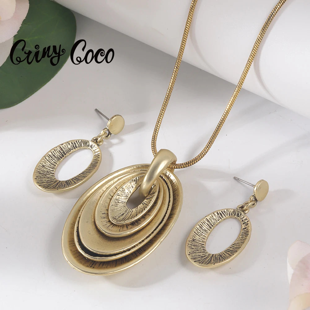 Zinc Alloy Set: Oval Multi-layer Circle Pendant, Snakeskin Necklace, Earrings