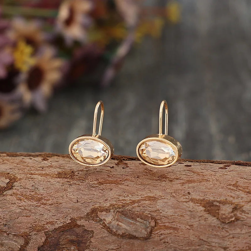 Bold Oval Champagne Stone Dangle Alloy Earrings