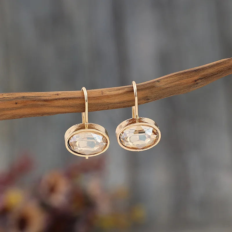 Bold Oval Champagne Stone Dangle Alloy Earrings