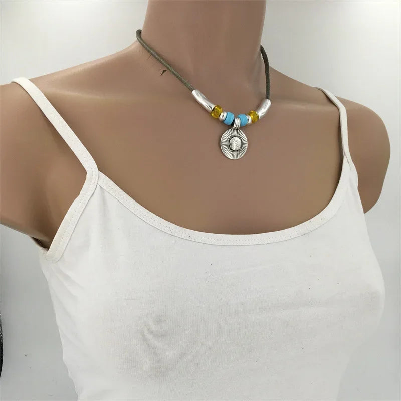 Boho Style Round Pendant Alloy Necklace with Faux Turquoise Beaded Leather Cord