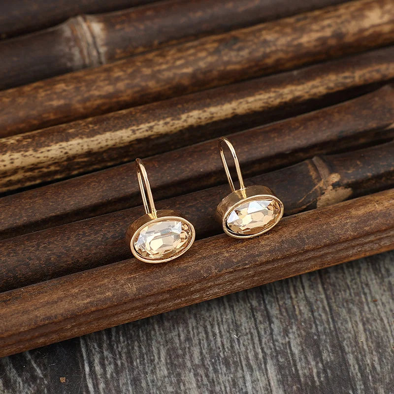 Bold Oval Champagne Stone Dangle Alloy Earrings